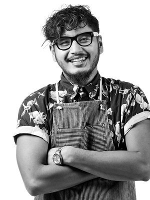 Tanakorn "Boom" Maneedam tietää, miten lohesta saa karkkimaisen herkullista. Kuva: <span class="photographer">Panu Pälviä.</span>